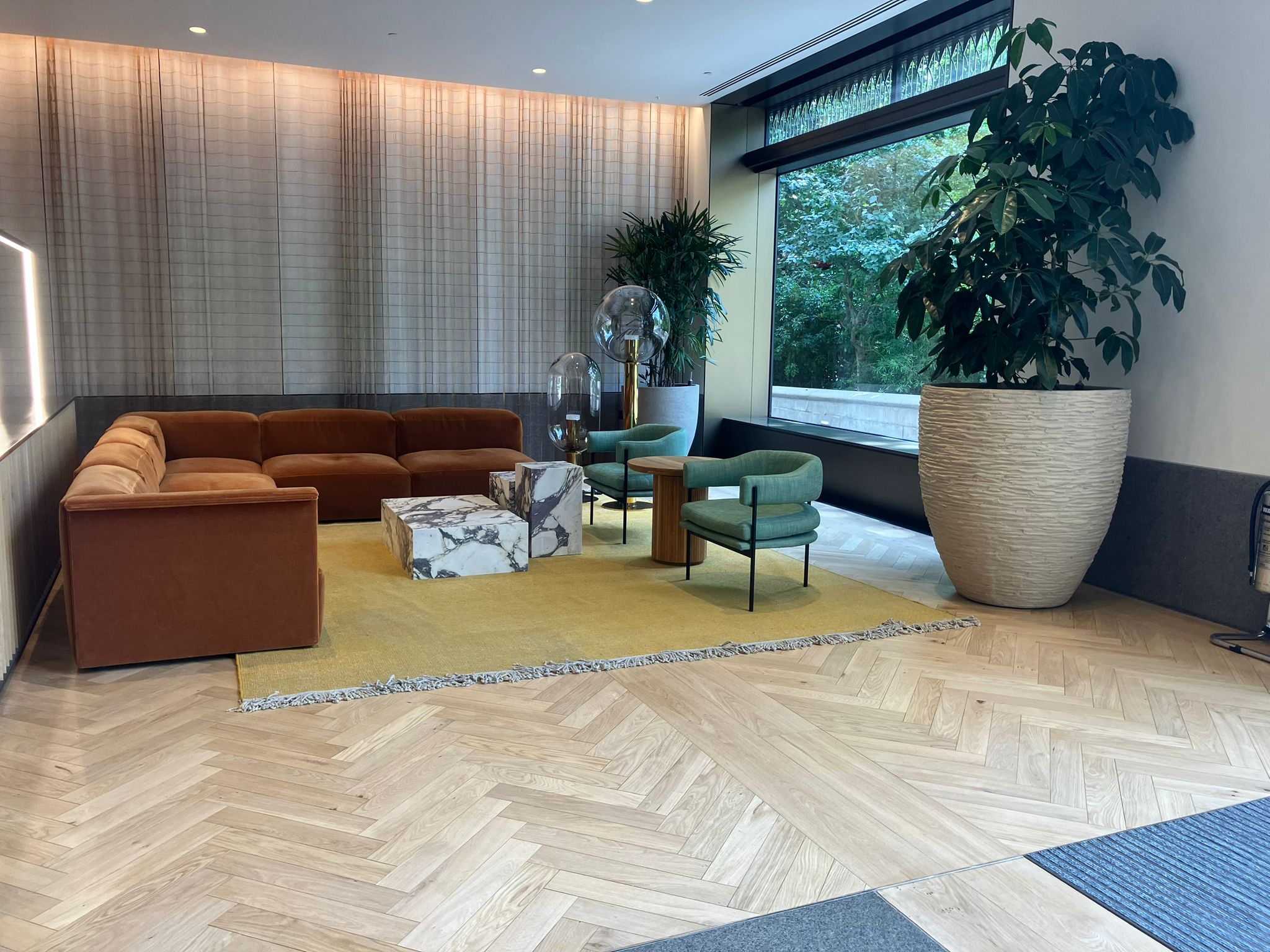 Refinished timber in lounge area of London office space - Loughton Direct