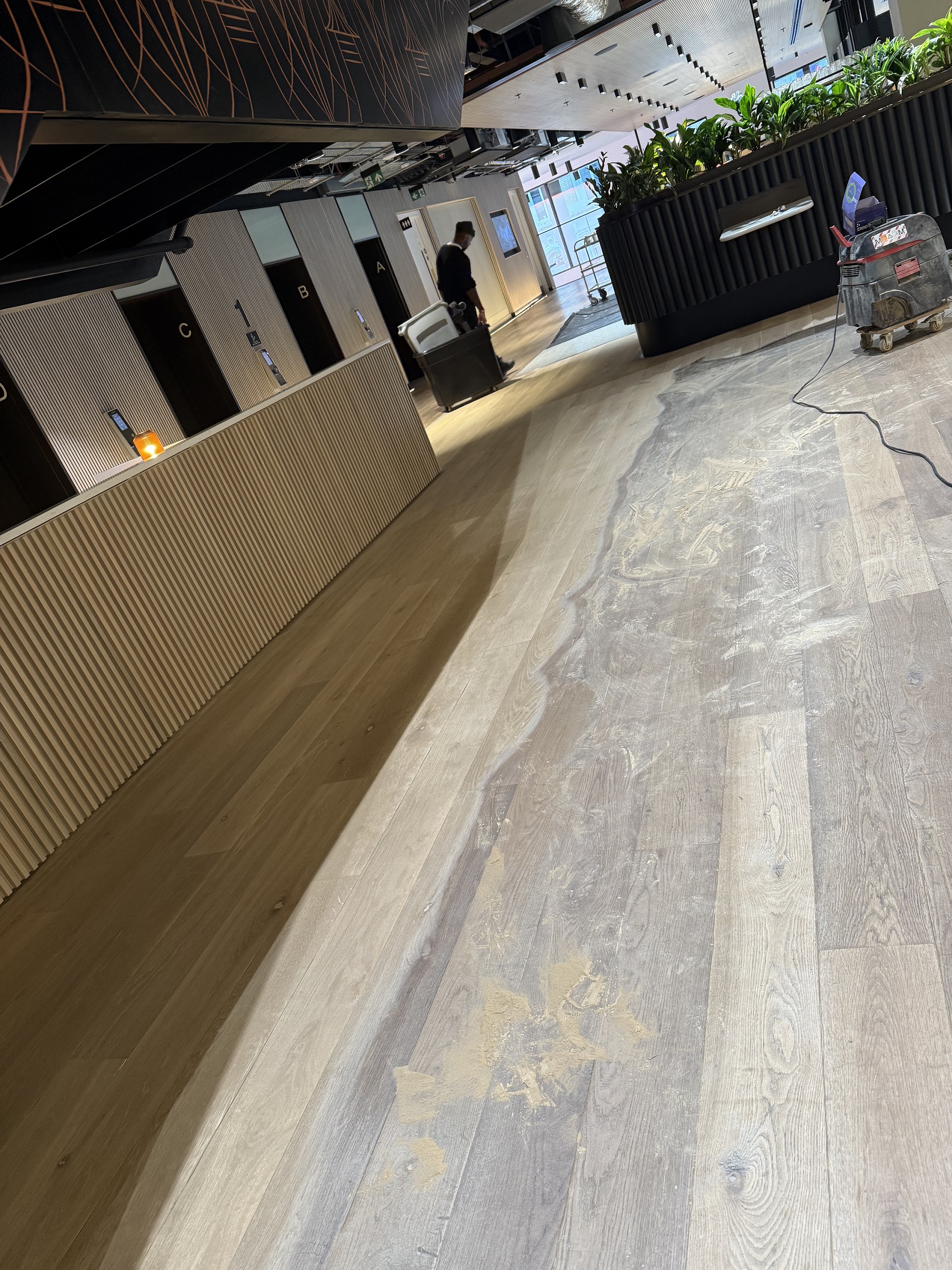 Worn timber being sanded before seal - Loughton Direct