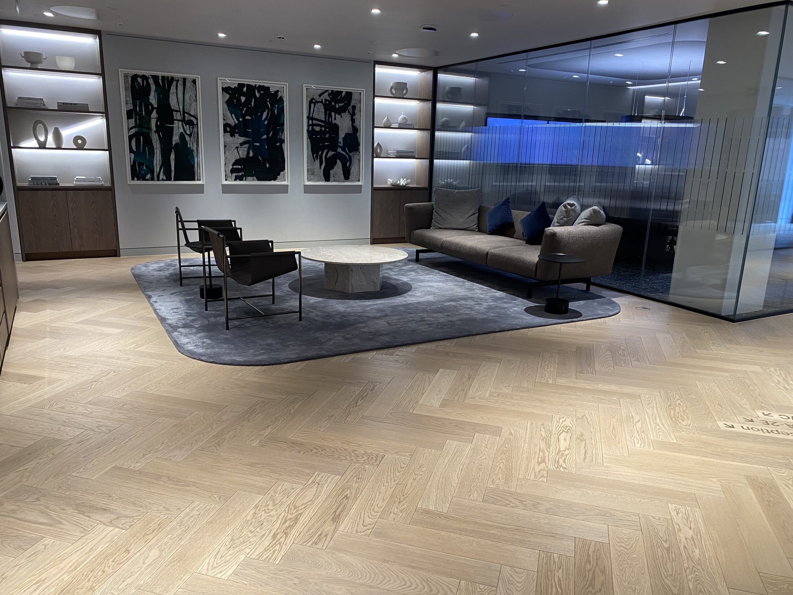 Sand and sealed timber floor in corporate space - Loughton Direct